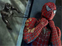 Venom is choking Spiderman