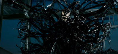 The symbiote is hurt and unattached from Brock